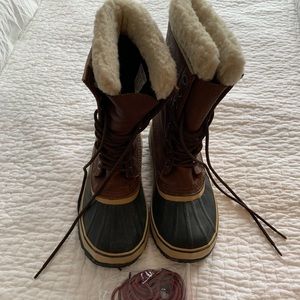 New Sorel boots- never worn. Extra maroon laces.